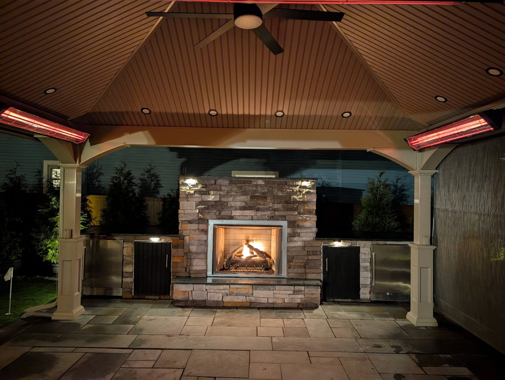 Patio fireplace lighting at night